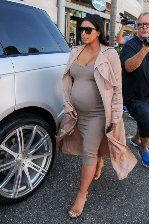 Kim Kardashian Totally Used a Body Double to Try on Her Maternity Clothes